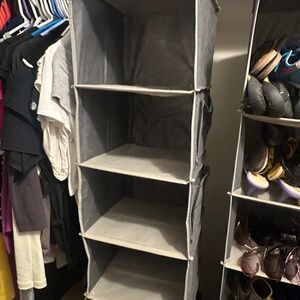 Two hanging storage units for closet